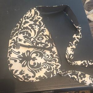 Baggallini Black and Cream Floral Backpack